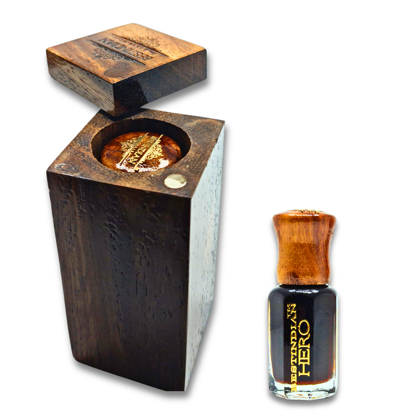Best Indian Perfume for men: BestIndian™ Hero perfume oil with its wooden cap, next to the engraved wooden presentation case for this roll-on luxury fragrance.