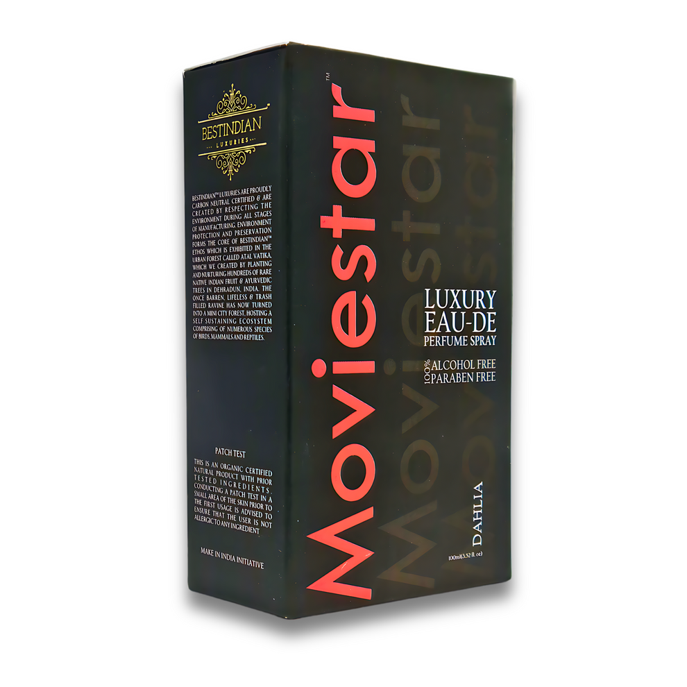 Angled view of the best Indian unisex perfume- Moviestar™ Dahlia luxury black box packaging featuring sustainability information, eco-friendly practices, and patch test details, showcasing this long lasting floral perfume with organic certified ingredients, alcohol-free EDP formula, and environmentally conscious manufacturing crafted in Dehradun with Make in India initiative.
