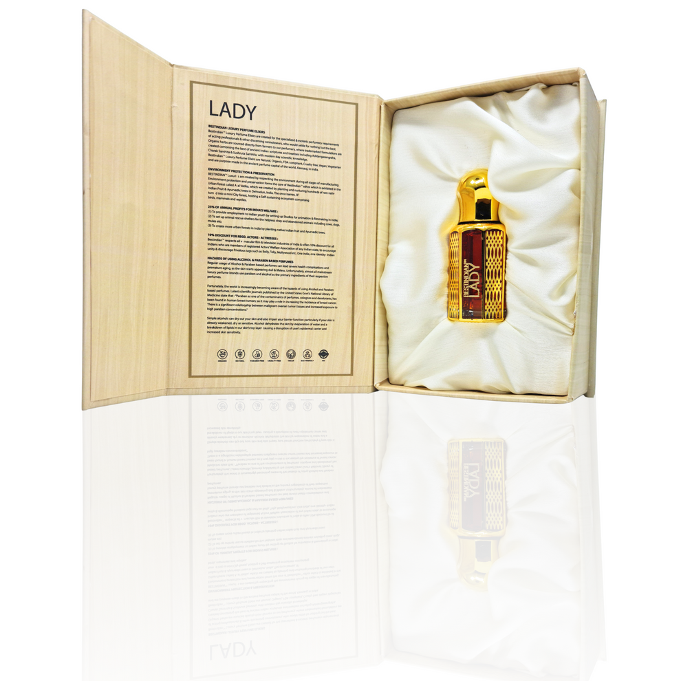 Lady Luxury Perfume Elixir — handcrafted natural chocolate attar for women, shown with premium wooden box open to reveal the ornate bottle resting on satin cushion.