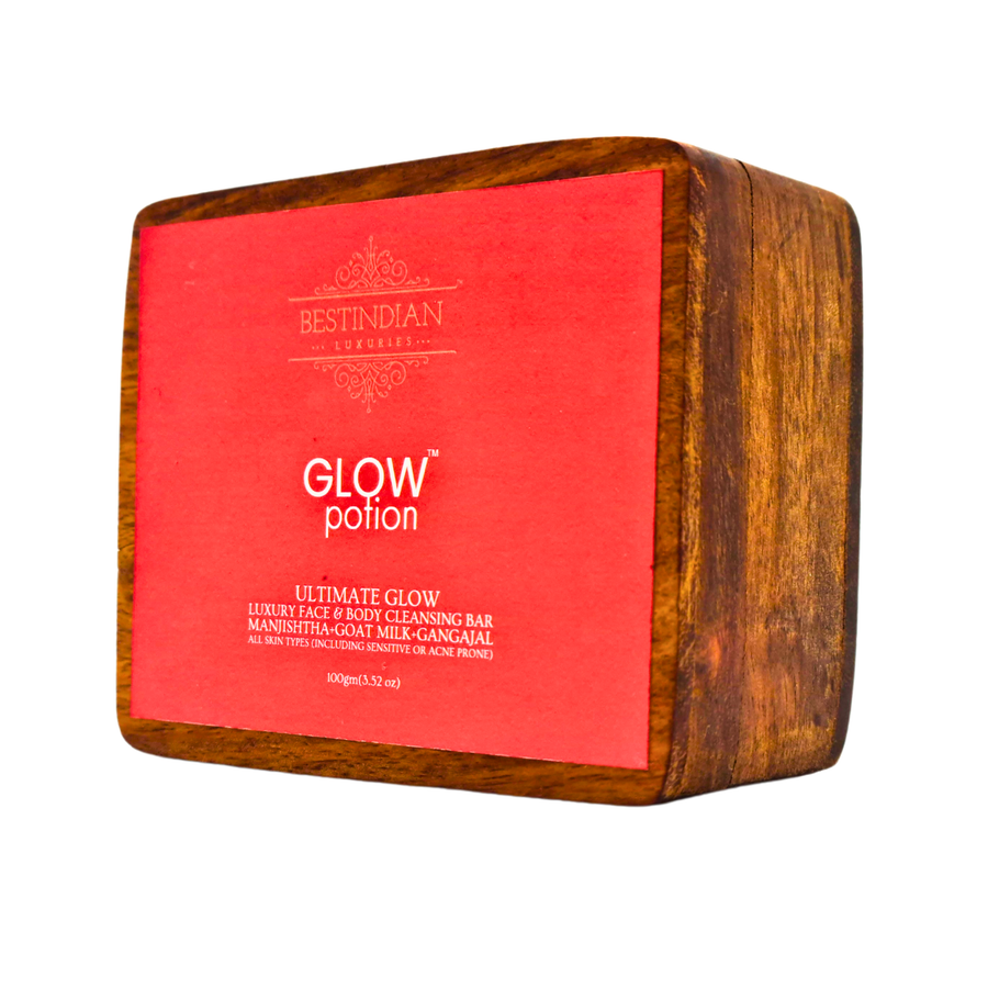 The Glow Potion skin brightening soap, featuring Manjistha and Goat Milk, presented in its premium wooden gift box.