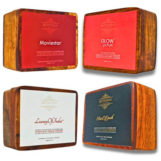 Four organic and natural BestIndian cleansing bars arranged in a 2x2 grid on a white background. The products are shown in their wooden boxes with labels: Moviestar, Glow Potion, Luxury Of India, and Elixir of Youth.