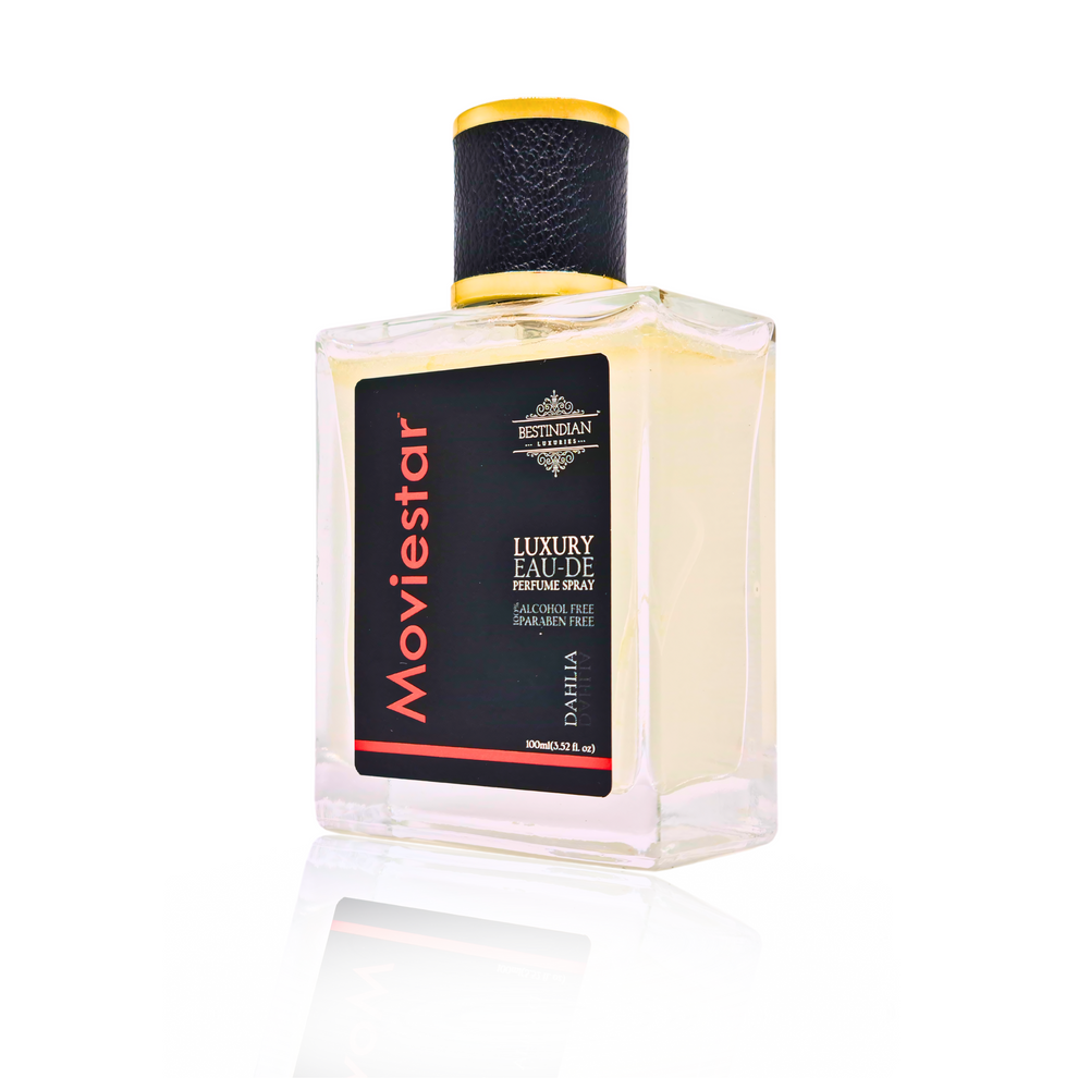 Front angled view of Moviestar™ Dahlia sweet perfume for women in elegant clear glass bottle with gold cap and sophisticated black label, featuring this long lasting floral perfume with glamorous, radiant dahlia notes and alcohol-free EDP formulation.