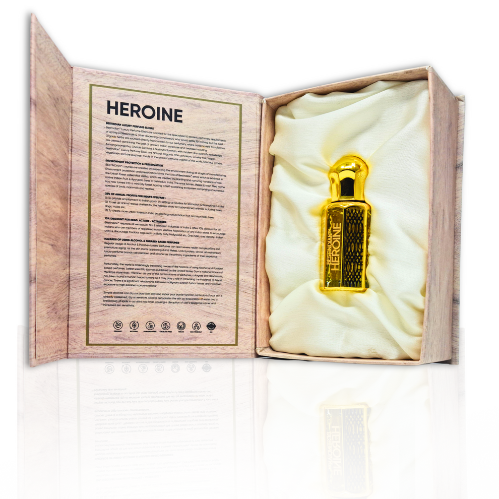 BestIndian™ Heroine oriental attar for women — luxury perfume elixir in gold bottle nestled on satin cushion inside collector’s box.