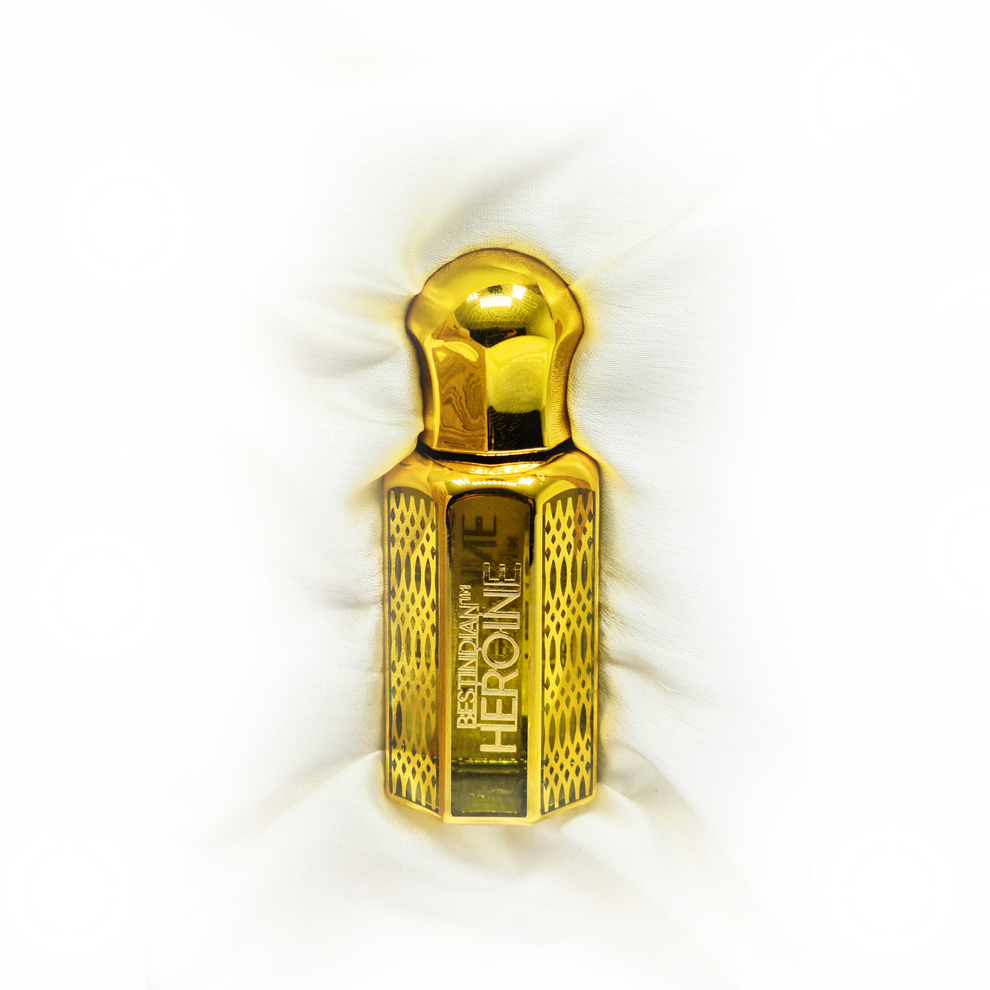 BestIndian™ Heroine Perfume Elixir — concentrated tobacco attar in a gold artisanal roll-on bottle.