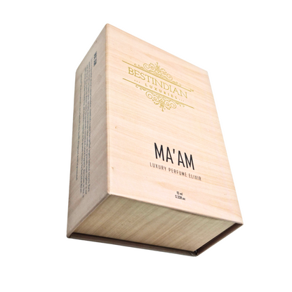Angled view of BestIndian™ Ma'am wooden box displaying detailed product information and ingredient transparency, showcasing this elegant musk perfume oil for women with natural alcohol-free formulation and oriental woody attar characteristics.