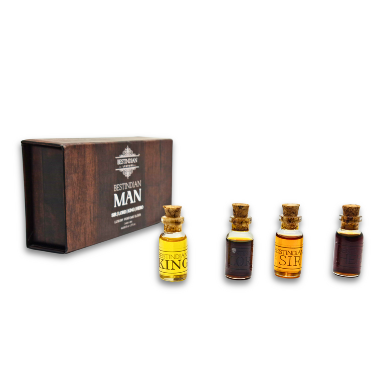 Four miniature BestIndian™ Man Perfume Elixir dab-on vials with their dark wooden-themed packaging.
