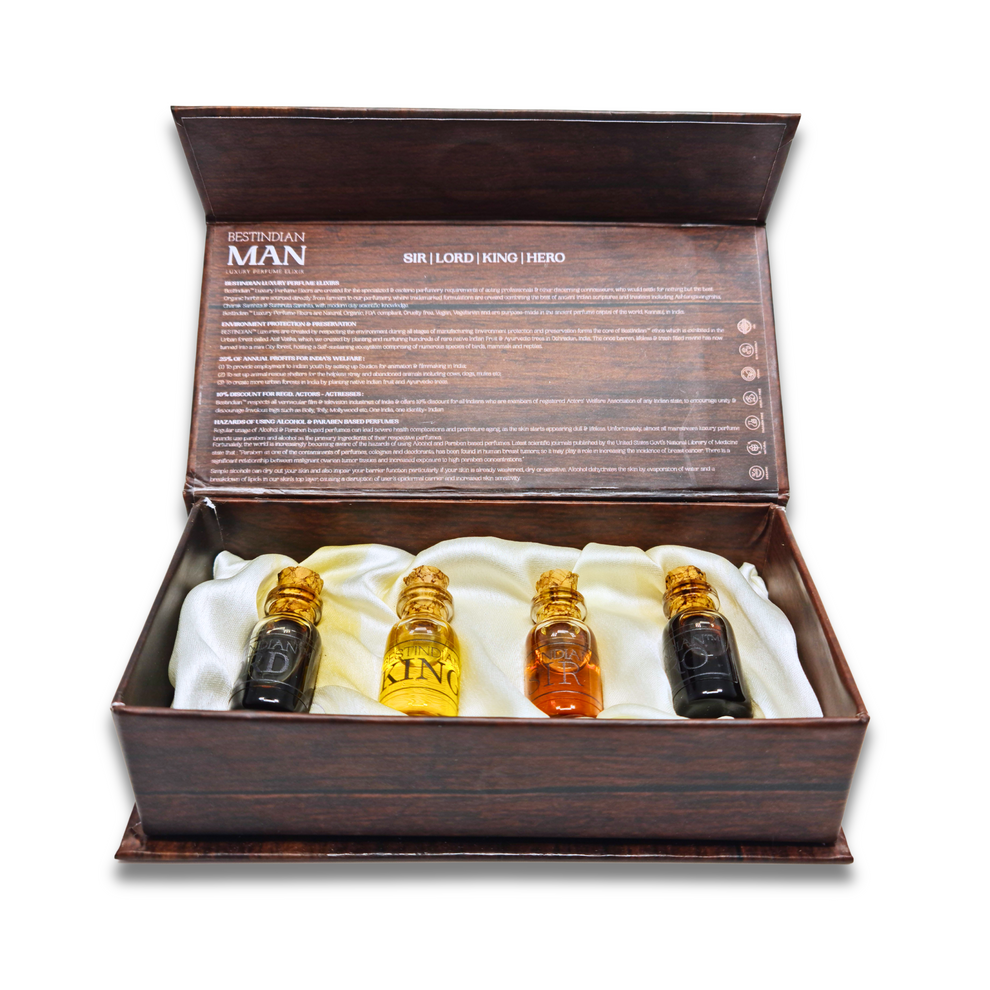 BestIndian™ Man luxury attar miniatures with cork stoppers, presented on a cream-coloured cushion inside the gift box.