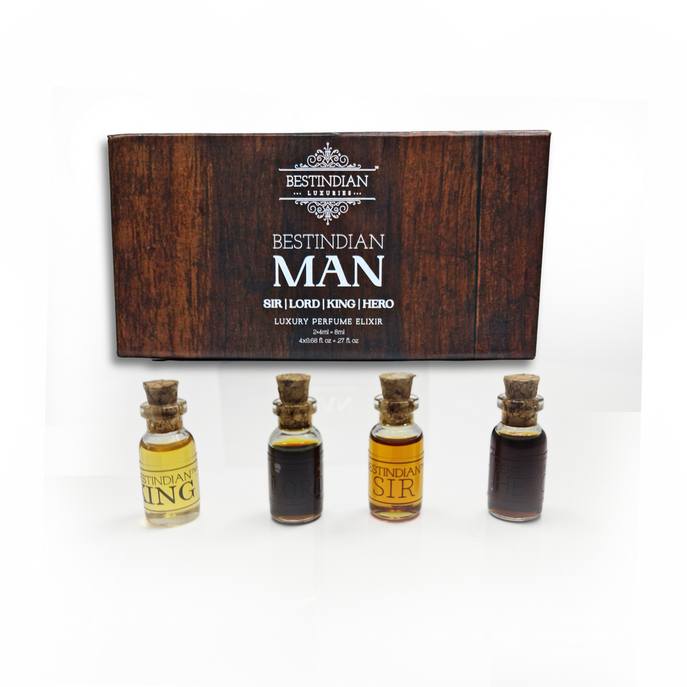 Mini perfume set featuring four 2ml attar vials – King, Sir, Hero, and Lord, placed on front of a luxurious dark wooden themed box.