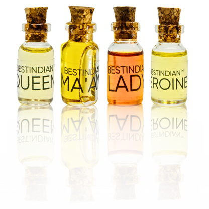 BestIndian™ Woman miniature perfume set for women — four attar vials with cork pullout caps, featuring elegant miniature bottles labeled Queen, Ma’am, Lady, and Heroine, perfect as a travel-friendly perfume discovery set or vegan cruelty-free gift for her.