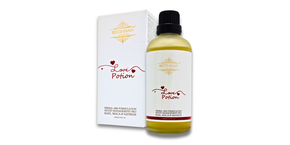 LovePotion™ potion bottle and box, an Ayurvedic herbal tea for mood support with basil, maca, and saffron.