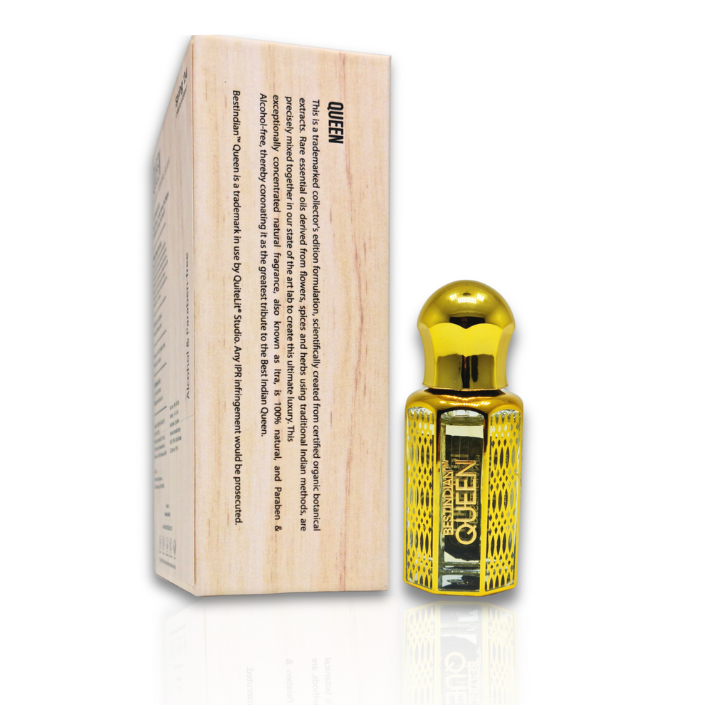 Side presentation of BestIndian™ Queen luxury perfume elixir with its premium wooden box displaying detailed product information, highlighting this elegant vetiver attar with sandalwood and vanilla undertones in its sophisticated golden roll-on bottle.